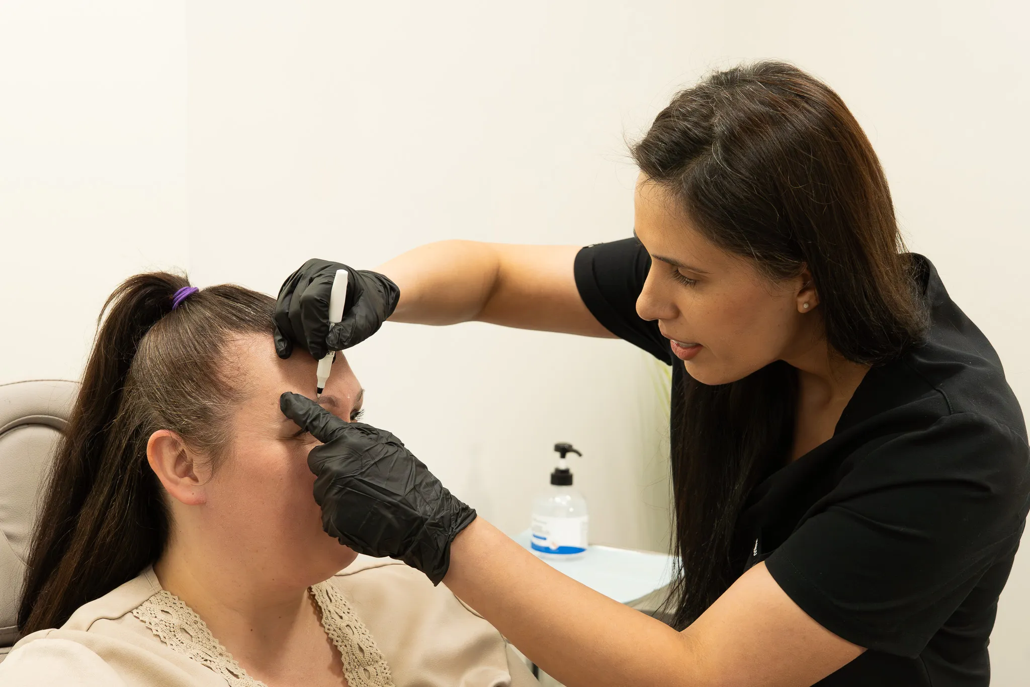 Dr. Sundeep Sarai performing a Botox® treatment at Serene Rejuvenation in Surrey.