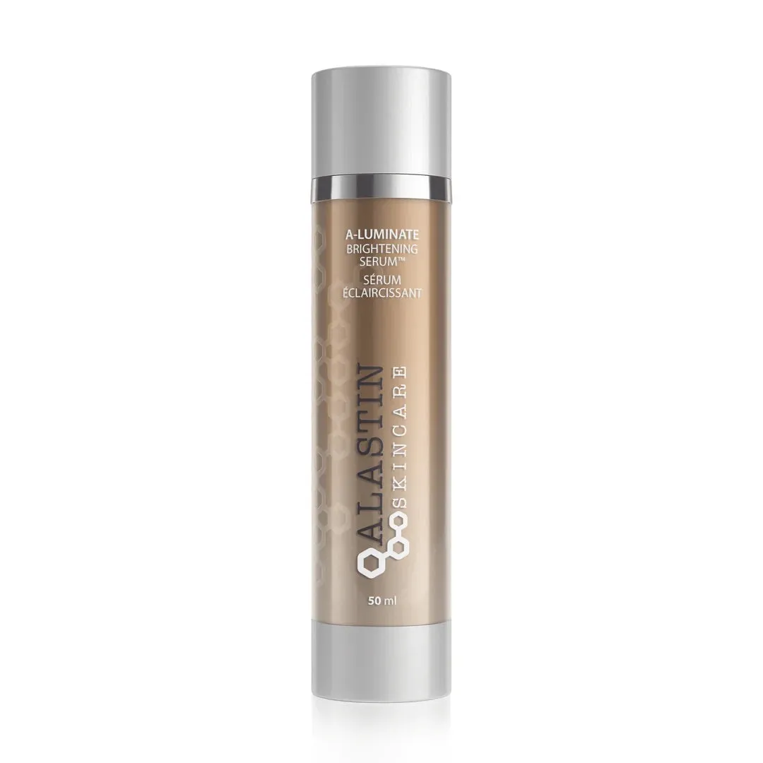 A box and bottle of ALASTIN A-LUMINATE Brightening Serum